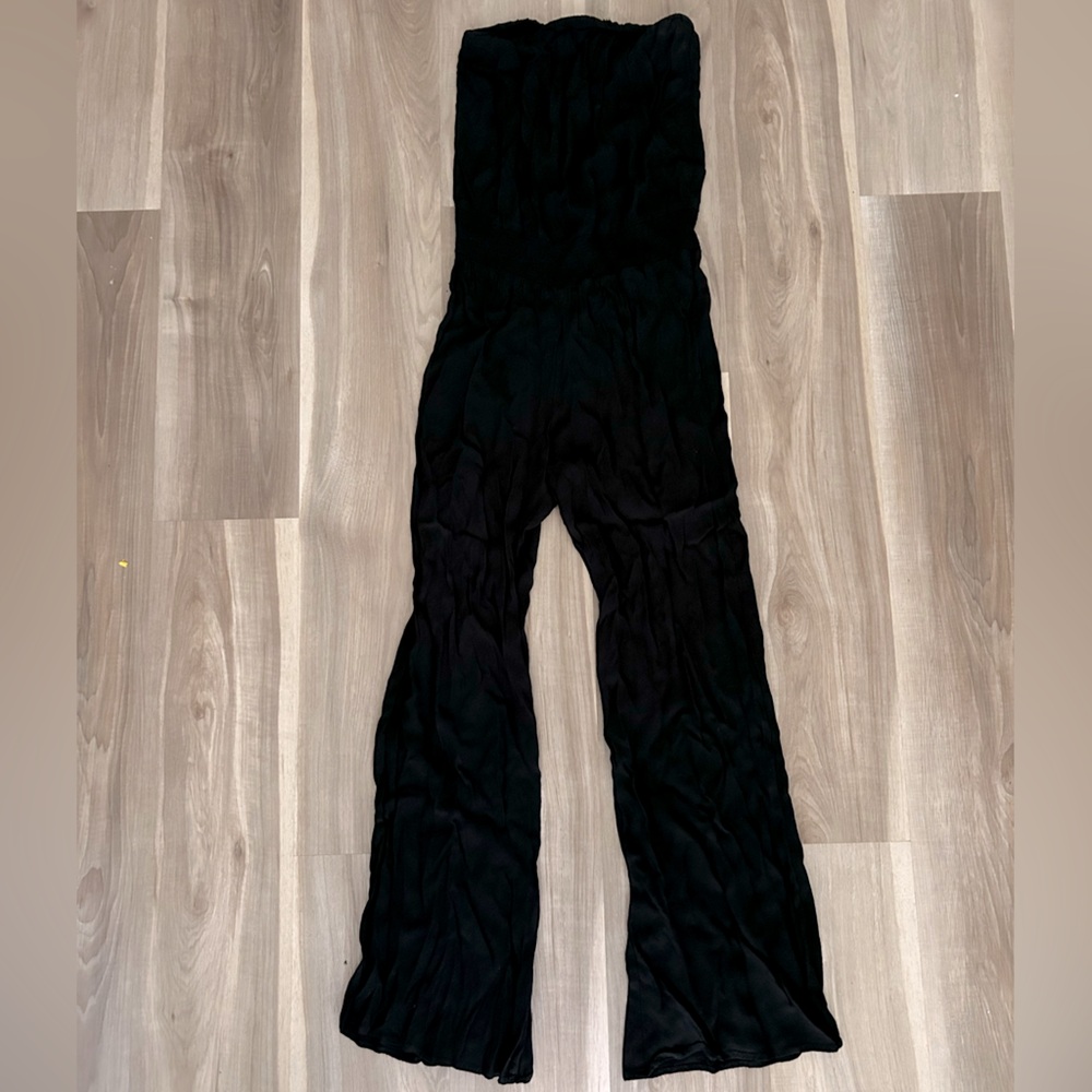 Stella Laguna Beach black pant romper. Tag is ripped off but fits like a true M